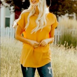 Cap sleeve, round neck tunic.